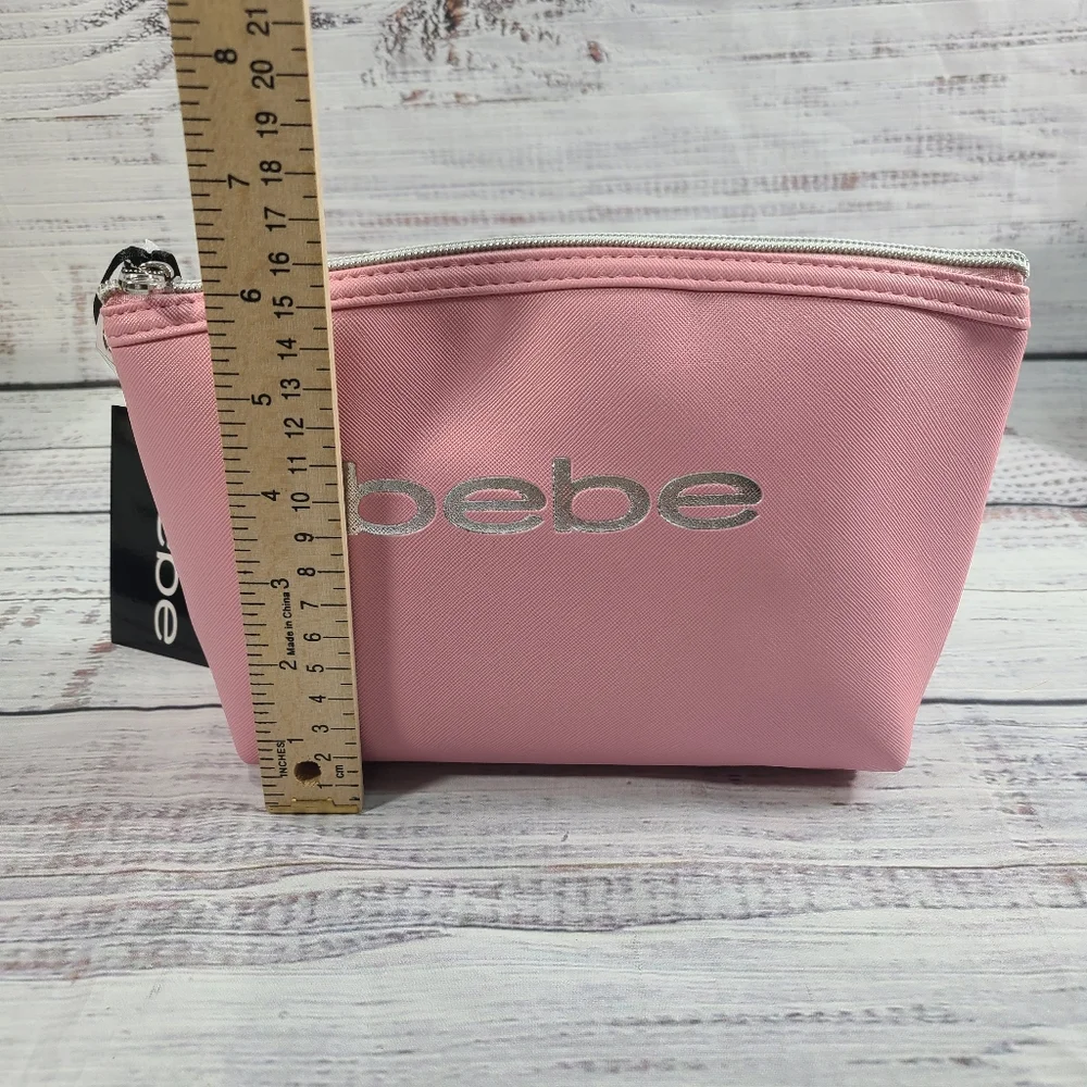 Bebe Pink Cosmetic Bag Sleek Design Zipper Closure With Two 1.6 Oz Bottles NWT